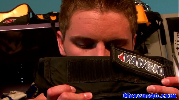 Athletic jock jerking his cock in lockerroom