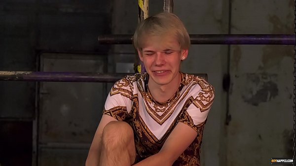 Bondage enthusiast Sean Taylor stroking waxed twink cock