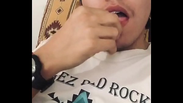 American Indian Boy fooling around while brother-in-law is jerking in living room