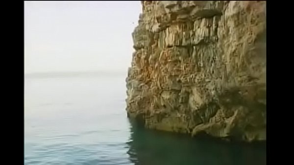 Chisled Enrico Benetton disfrutando de la playa