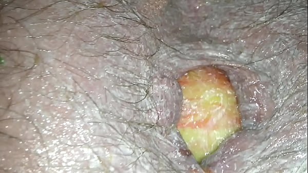 Ass stretching with 4 apple inside