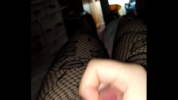 crossdresser masturbating in fishnets