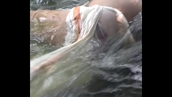 gay couple fucking bareback in water