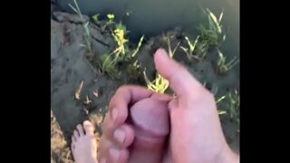 Hard cock on a public beach